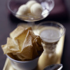Pear Clafoutis with Phyllo Crisps, Cider Sauce, and Quince Sorbet