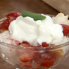 Angel Food Cake with Flambeed Strawberries and Whipped Cream