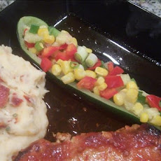 Corn and Bell Peppers Stuffed Zucchini