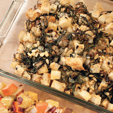 Rustic Bread Stuffing with Red Mustard Greens, Currants, and Pine Nuts