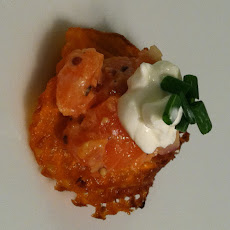 Salmon tartar on sweet potato waffle chip