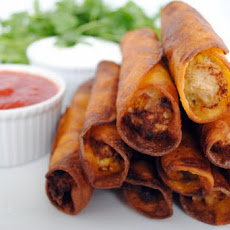 Chicken & Green Chile Taquitos with Coriander-Sour Cream Sauce
