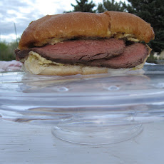 Steak Sandwich with Roasted Garlic Aïoli Worthy of a Pedestal (With Caesar Salad Waiting in the Wings)