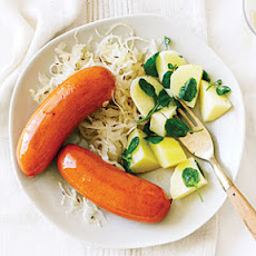 Wine-Glazed Sausages with Watercress Potatoes and Sauerkraut