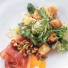 Eggs with Serrano Ham and Manchego Cheese, Green Olive Relish, and Migas
