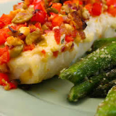 Baked white fish with Onions, Peppers, Olives, and Feta