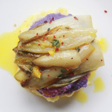 Baked chicory with orange butter sauce and red cabbage puree