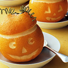 Frozen Orange Jack O' Lanterns Filled With Ice Cream