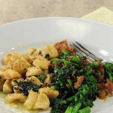 Gnocchi with Spicy Sausage, Caramelized Onions, and Broccoli Rabe