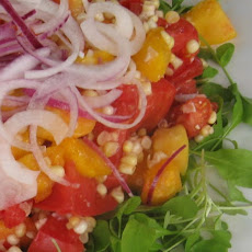 Cherry Tomato, Peach, Corn and Arugula Salad with Sweet Red Onion