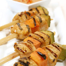 Tropical Chicken on Sugarcane Skewers with Peanut-Plantain Dipping Sauce