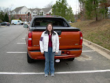 Katie standing next to the rear of the Avalanche.  See how tall it is?