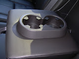 Cup holders for the Rear passengers.
