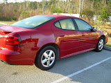 Our pretty little red Pontiac Grand Prix rental car.