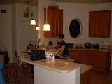 Katie getting more water from the kitchen.