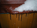 Icicles forming from the steam escaping the hot tube.