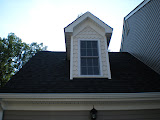 Dormer window from the office; this builder started the gingerbread accent siding in the neighborhood.