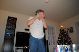 Dad pointing to his eye.