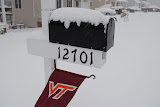 Neat shot of the flag blowing in the wind with the mailbox.