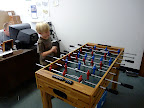 Playing foosball at the office.