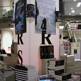 Neil's books were piled high at the entrance