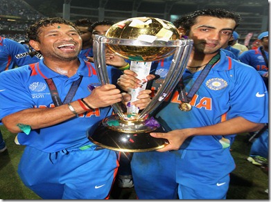 Sachin Tendulkar and Gautam Gambhir walk with the trophy