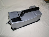 Astrotech asked for a prototype of a new hand-held analyzer product, to be used at a trade-show.  Astrotech supplied the CAD, which was modified by Capture to be suitable for prototyping.  Because the box is too large to fabricate all at once in most prototyping building machines, the shape was broken down into several panels and then assembled into the final shape.  Astrotech applied decals to the exterior and assembled a TFT display into the open bezel prior to the tradeshow.