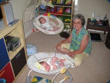 Grandma tending twins