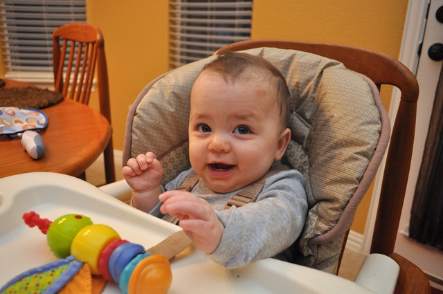 [hudster playing in his high chair[2].jpg]