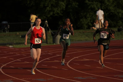 Sprinter Sara Gildersleeve coming off the turn in the 200m dash.