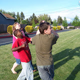 Preparing to catch the water ballon
