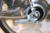 This bike is for kids - a coaster brake keeps it simple and clean.  The highly polished wheels give you a view of the backside of the mount.