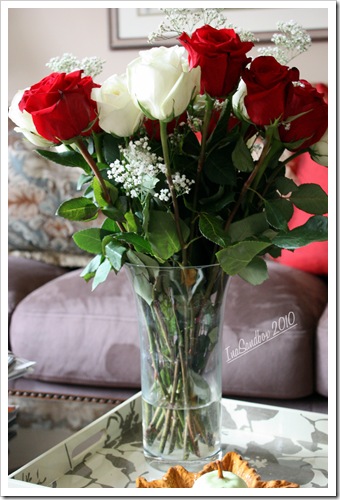 Vase of red and white roses
