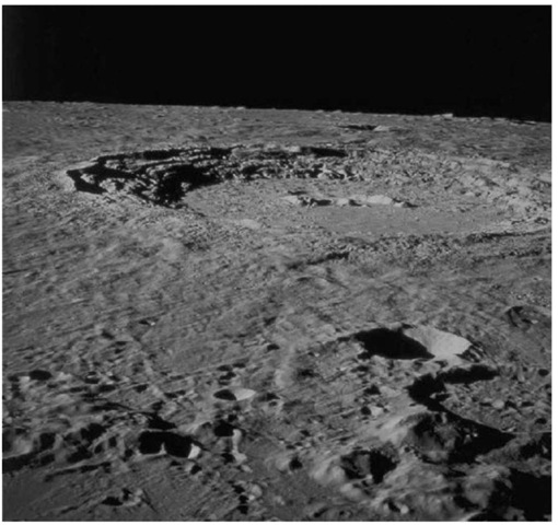 The 95-km diameter impact crater Copernicus as seen from the Apollo 17 Lunar Module Challenger after its departure from the Moon on 14 December 1972. Data from the Apollo 12 mission indicate that Copernicus formed about 900 m.y. ago (courtesy of NASA). This figure is available in full color at http://www.mrw.interscience.wiley.com/esst.