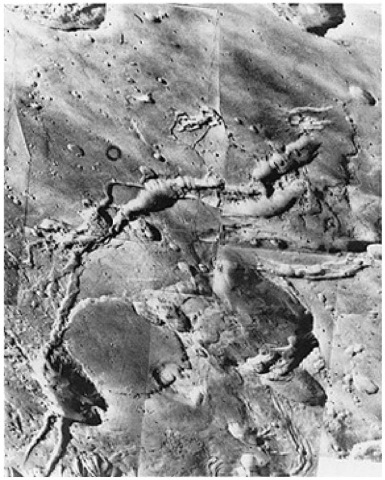  A view obtained by Viking 1 on July 8, 1976 showing what appear to be fault zones in the martian crust in an area two degrees south of the equator. The fault valleys are widened by mass wasting and collapse. Mass wasting is the downslope movement of rocks due to gravity (possibly hastened by seismic shaking if present).