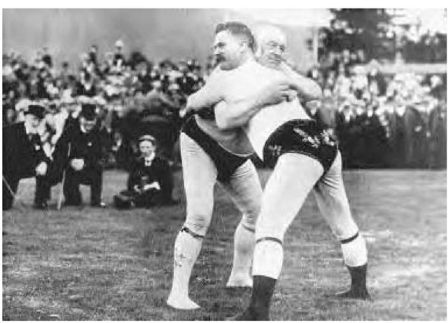 One of the giants of the Cumberland style of wrestling, George Steadman (left), and Hex Clark during a match. 