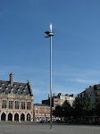 Sculpture of fly speared on a needle