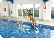 Take Time to Relax in the Indoor Heated Swimming Pool