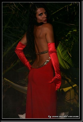 Classy_mature_tanned_back_in_red_long_night_dress