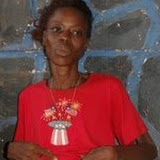  &ndash; Gladys showing her swollen stomach. .....© 2008 NHA Photo