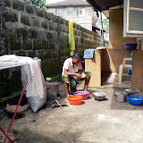  &ndash; Kadijah preparing dinner (James Mansaray, photographer)