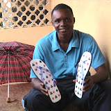  &ndash; Albert receiving flip flops collected from Nazareth House in USA. (picture taken by James Mansaray)