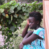  &ndash; Jodie Mansaray, troubled with severe side pain. 2007 (James Mansaray, photographer)