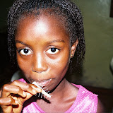 &ndash; Ann Marie getting every bit of fish of the bone (James B. Mansaray, photographer)