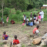  &ndash; Some of the children gather around to help clear the land of rocks, etc. to prepare for the building of their school. © NHA, J Mansaray 2007