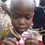  &ndash; Rosaries and lollipops, what great gifts! © NHA, J Mansaray 2007