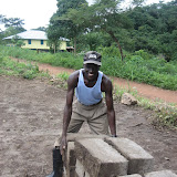  &ndash; Pa Foday carrying bricks from the brick making site to the School Site: . ... © 2007 NHA photos, J Mansaray