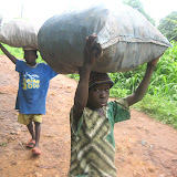  &ndash; Sierra Leone: August 2007...Children carrying potatoes...© 2007NHA photographs/JBM
