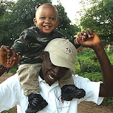  &ndash; Roo on his daddy's shoulders! 19 August 2007...© 2007 NHA photos, J Mansaray