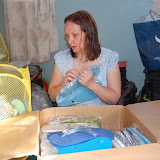  &ndash; Hospital supplies in yellow mesh bag, flip flops in box: preparing for Kabala trip.......© 2007 NHA photos